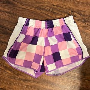 Nike purple, pink and white checkered shorts